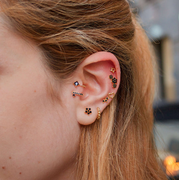 piercing tragus oreja